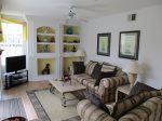 Living Room off of Kitchen with direct access to Pool